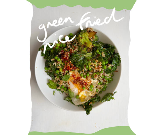 Green fried rice with vegetables, crispy onions, chilli sambal and fried egg