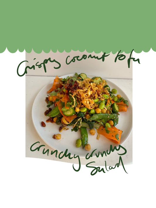 Crispy coconut sesame tofu salad with cucumber, roasted vegetables, edamame, chickpeas and peanut salsa